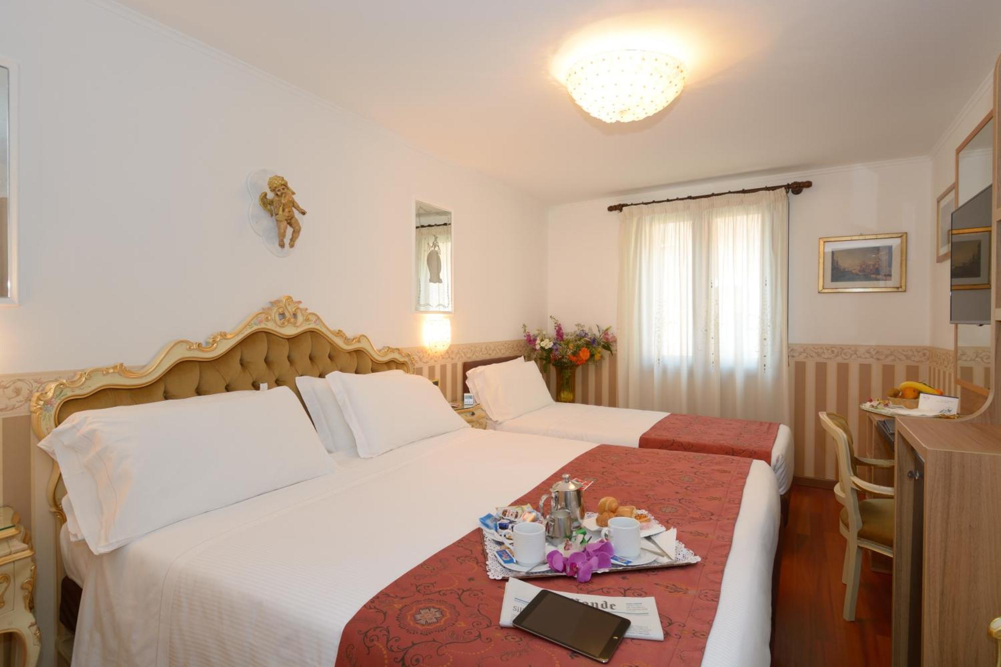 UNAHOTELS Ala Venezia Camera foto